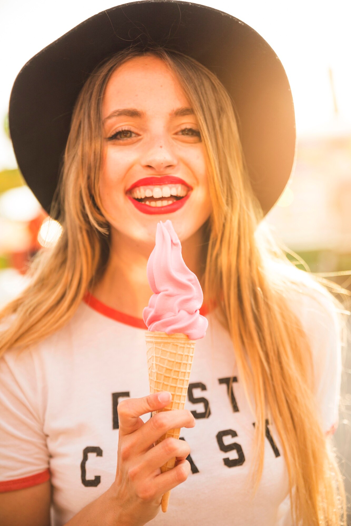 portrait-happy-young-woman-holding-ice-cream_23-2147911700